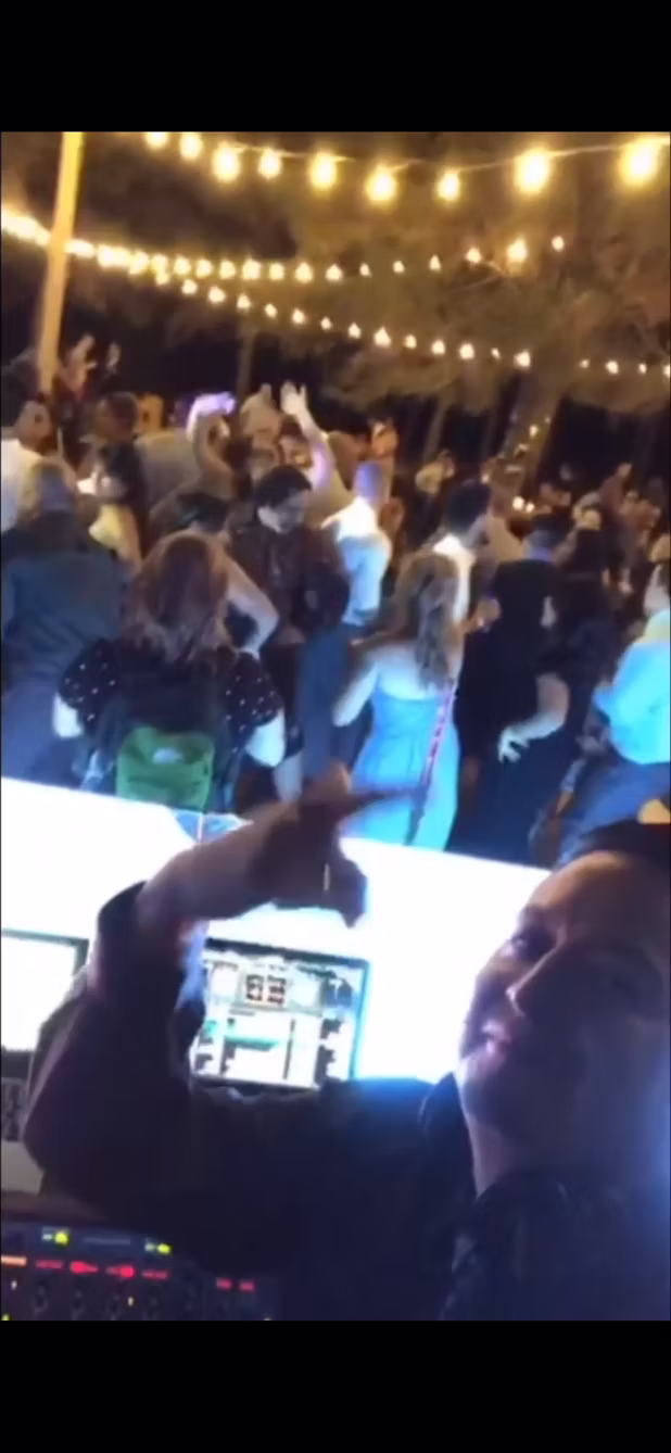 DJ Serrato professional DJ booth setup with custom lighting at Arizona venue